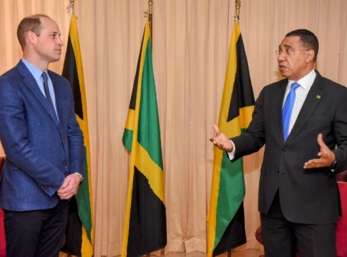 Prime Ministe Andrew Holness (right) in conversation with His Royal Highness, the Duke of Cambridge, during a courtesy call. (Photo: JIS)